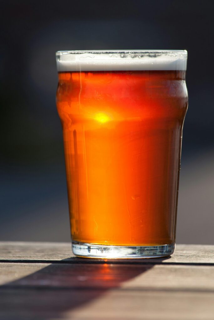 Red Beverage in Clear Drinking Glass